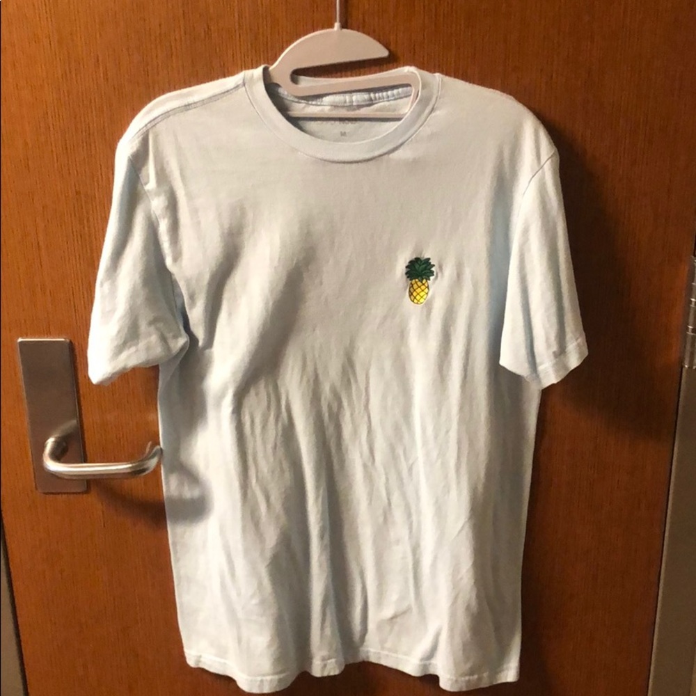 light blue pineapple shirt